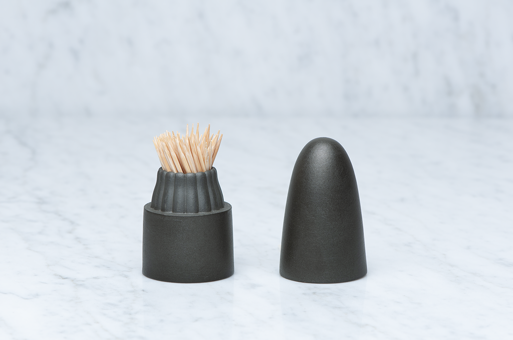 Mörkgrön rundtoppad tandpetarburk i keramik med locket av