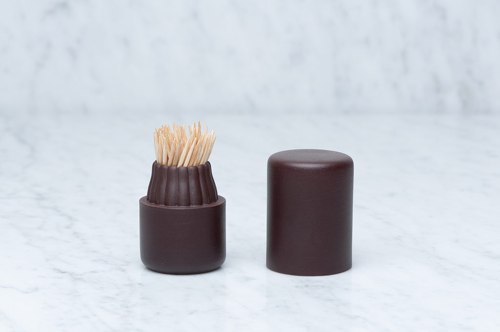 Mörkbrun cylinderformad tandpetarburk i keramik med locket av